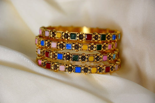 Graceful Four Gold-Plated Bangles Set